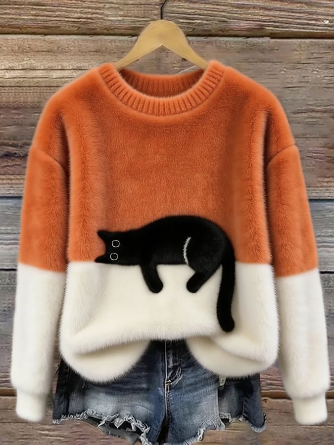 Damen Oversized Pullover mit Katzenmotiv von hinten in modischem Strickdesign