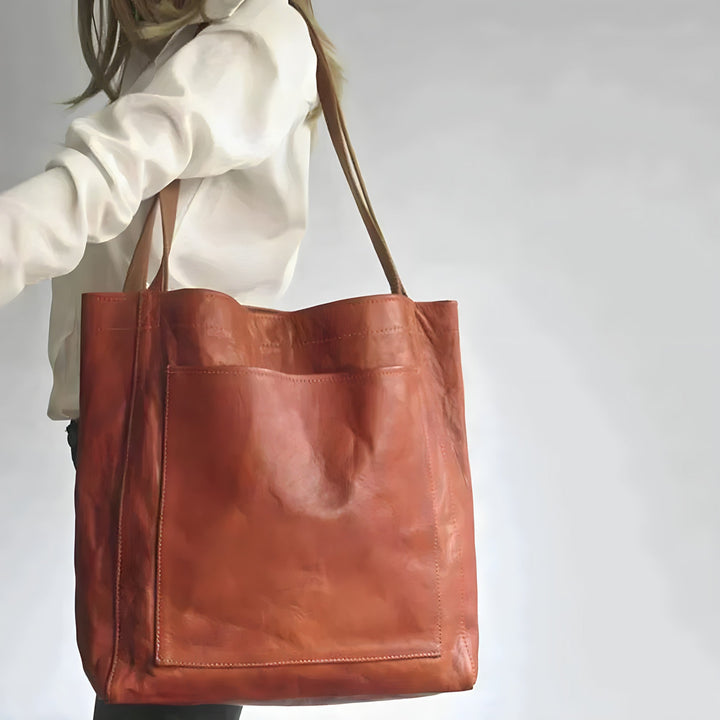 Geräumige dunkelbraune Ledertasche für Damen. Hochwertige Schultertasche aus Echtleder, perfekt für Business & Freizeit.