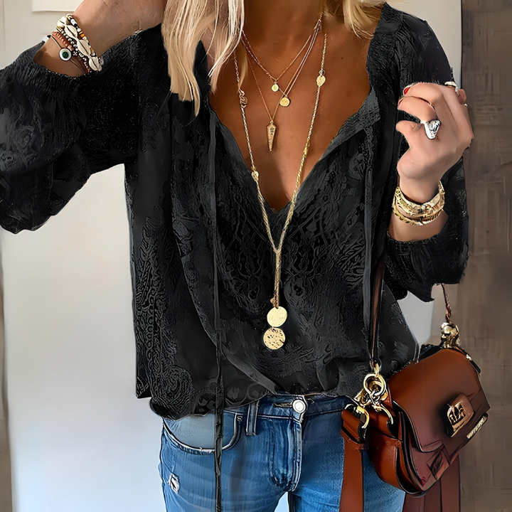 Feminine, elegante Damenbluse mit V-Ausschnitt & lockerer Passform, ideal als Sommer-Freizeitbluse.