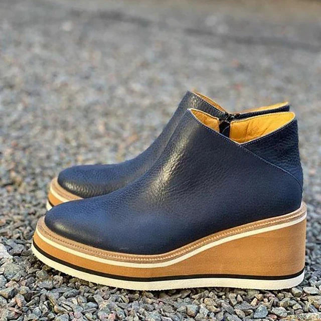 Hochwertige Damen Keilstiefeletten: Moderne Stiefeletten mit Keilabsatz für bequemen und stilvollen Alltag.