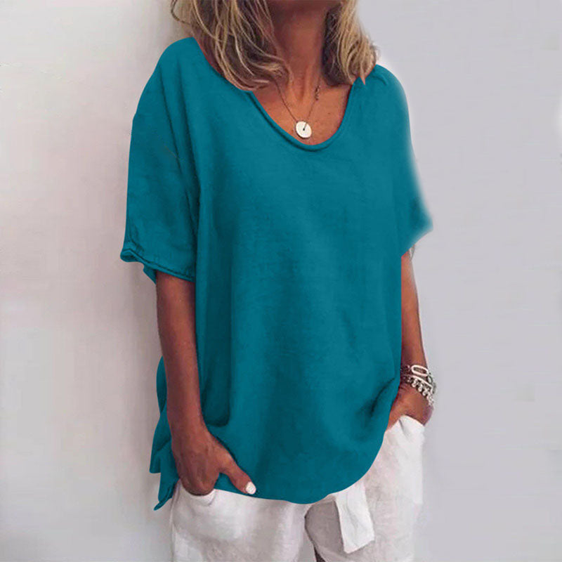 Stilvolle Damenbluse mit kurzen Ärmeln und lockerem Schnitt, ein vielseitiges Oberteil für Frauenmode.