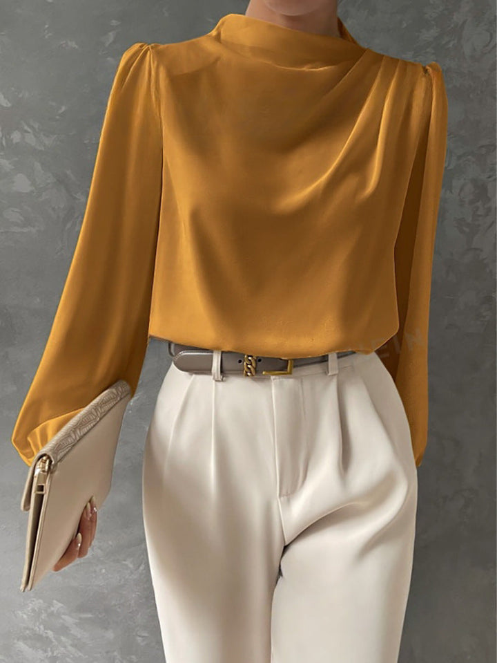 Detailaufnahme der hochwertigen Damenbluse mit langen Ärmeln, ideal für Büro und Alltag.