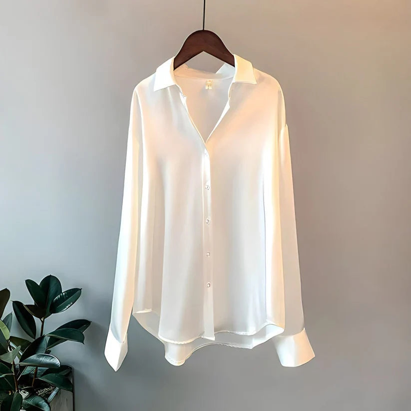 Klassische Damenbluse mit langen Ärmeln. Elegante Optik, perfekt als festliche Bluse oder stilvolles Büro-Outfit.