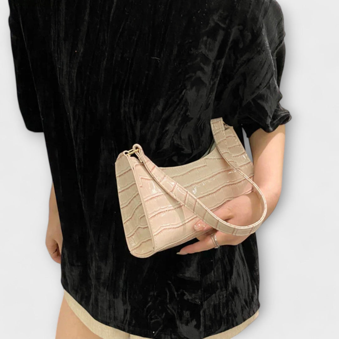 Klassische Damen Handtasche in Schwarz, stilvolles Kunstleder Accessoire für den Alltag.