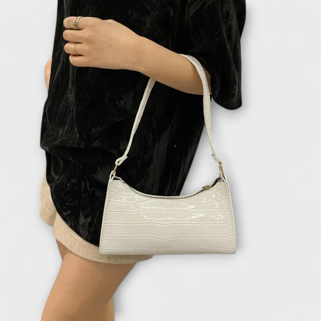 Modische Damen Sommertasche, helles Kunstleder Design, perfekt für elegante Auftritte.