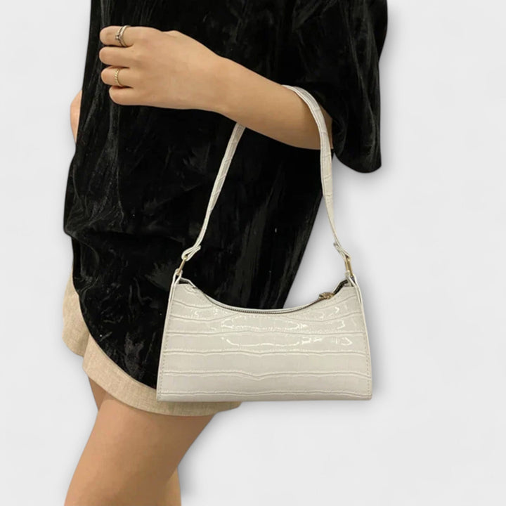 Modische Damen Sommertasche, helles Kunstleder Design, perfekt für elegante Auftritte.