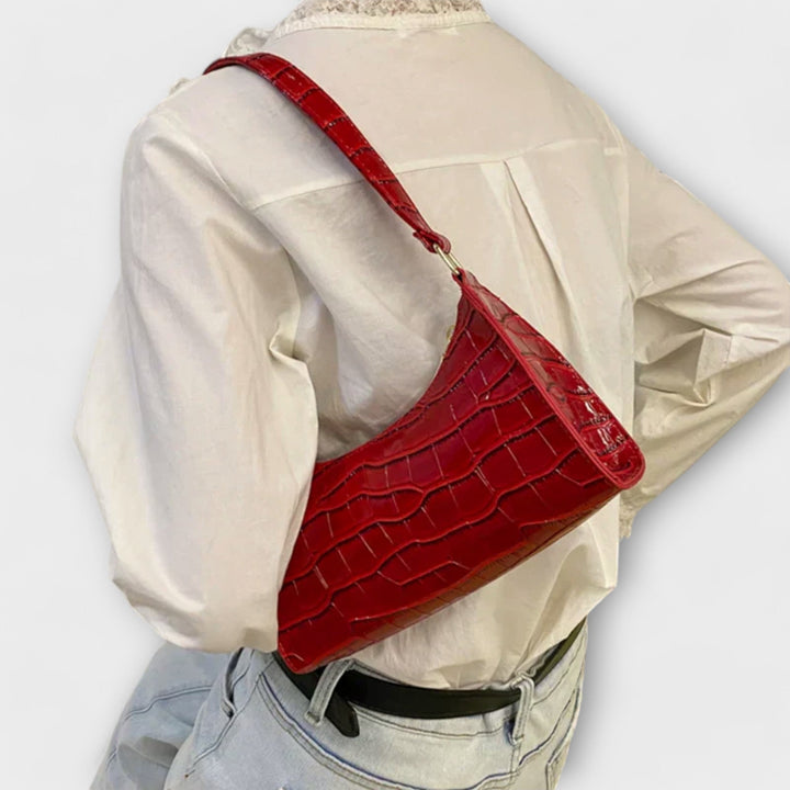 Zeitlose Damen Schultertasche, geräumig, aus hochwertigem Kunstleder, vielseitig einsetzbar.