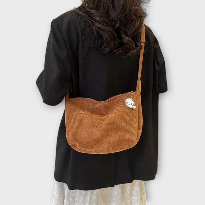 Damen-Handtasche, elegant und modern; ideal für sommerliche Outfits.
