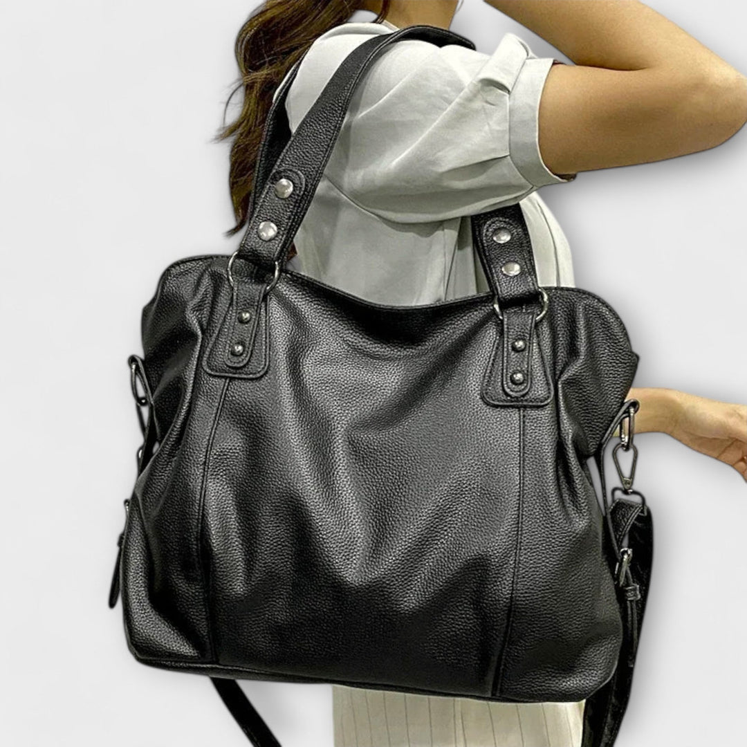 Stilvolle schwarze Damen Schultertasche, elegant & modern, perfektes Accessoire für Sommer & Freizeit.