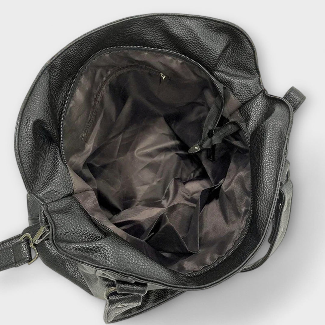 Schlanke, elegante Damen Schultertasche, ideal für den Sommer. Modernes Design, vielseitiges Accessoire.