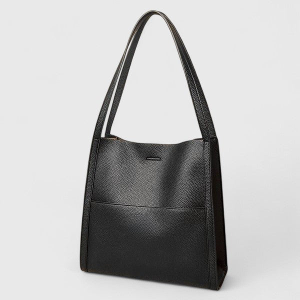 Stilvolle braune Damen Handtasche im minimalistischen Design. Elegante Schultertasche in Lederoptik, ideal für Business & Freizeit.