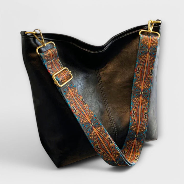 Modische, elegante Damen-Handtasche mit einzigartigem Riemen; ein Unikat für jeden Anlass.