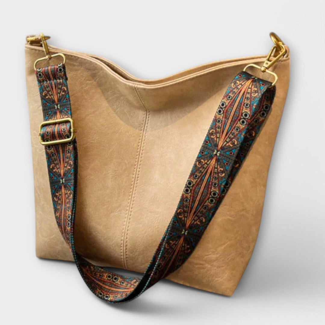 Sommerliche, farbenfrohe Damen-Schultertasche mit exklusivem Riemen; stilvolles Accessoire.