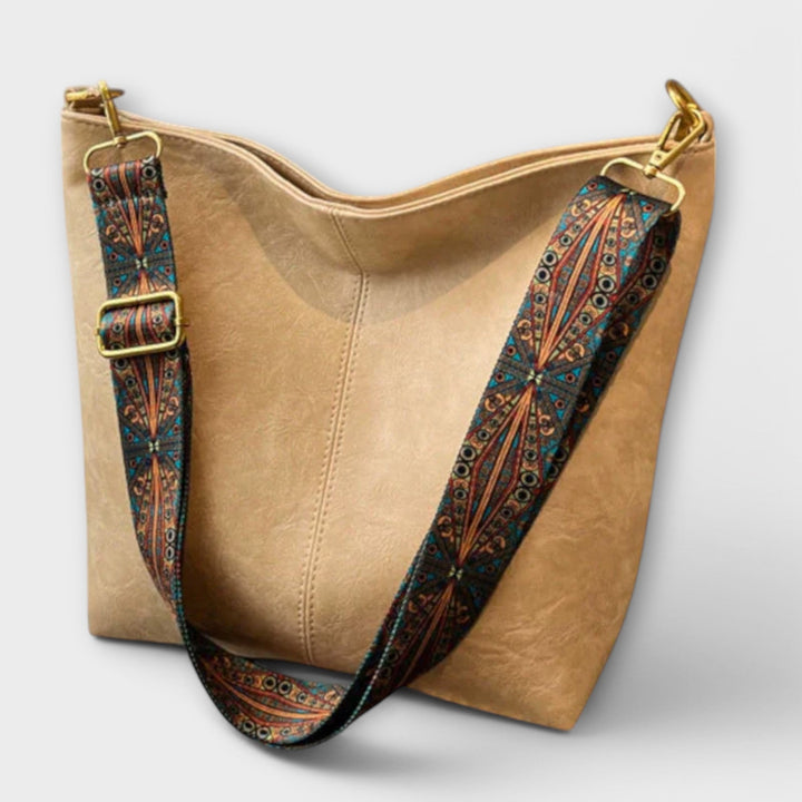 Sommerliche, farbenfrohe Damen-Schultertasche mit exklusivem Riemen; stilvolles Accessoire.