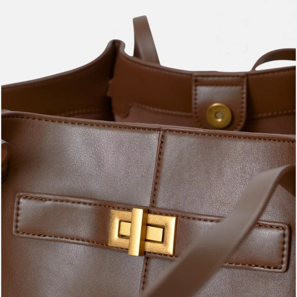 Große, elegante Handtasche aus Kunstleder für Damen. Perfekt als Shopper oder stilvolle Alltagstasche.