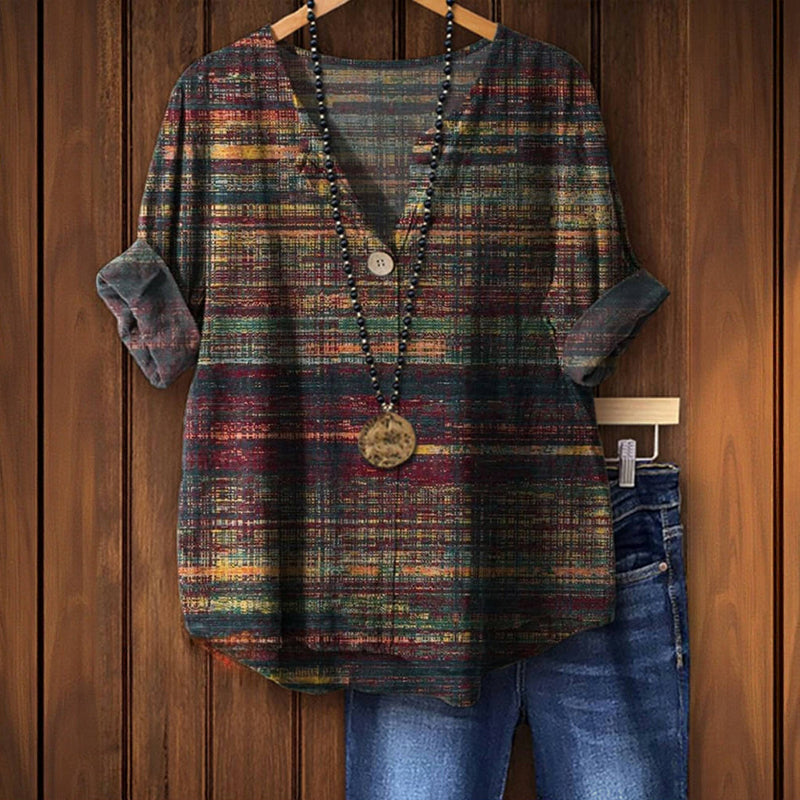 Leichte Damen Bluse für den Sommer. Modisches Oberteil mit V-Ausschnitt und lebhaftem Print, ideal für Casual Outfits.