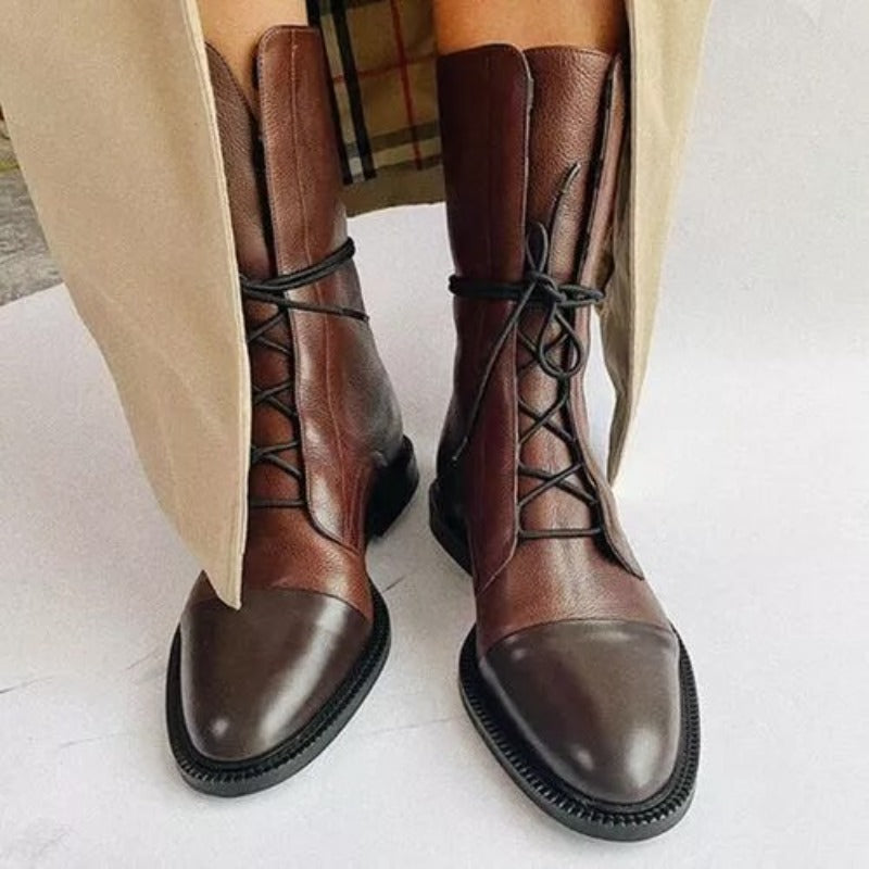 Moderne glatte Damen Winterschuhe mit Blockabsatz und Reißverschluss. Stilvolle Stiefeletten für Damen.