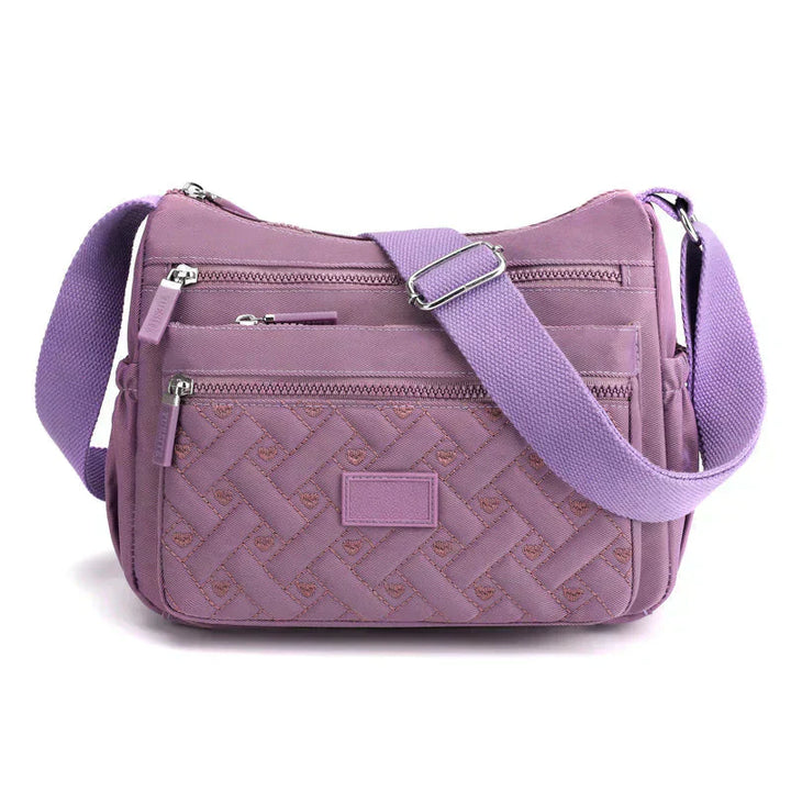 Moderne Damen Schultertasche mit durchdachtem Organizer, auch als elegante Handtasche für Damen Accessoires nutzbar.