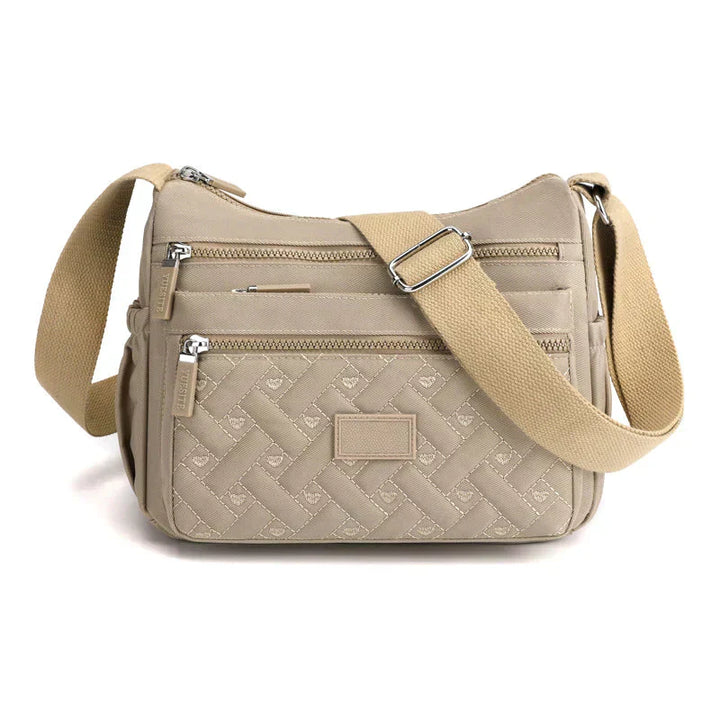 Robuste & stilvolle Damen Freizeittasche, wasserdicht und perfekt als praktische Crossbody Bag für den aktiven Alltag.