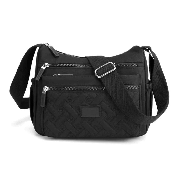 Leichte & elegante Damen Umhängetasche, perfekt als Crossbody Bag mit viel Stauraum für Handy & wichtige Utensilien.