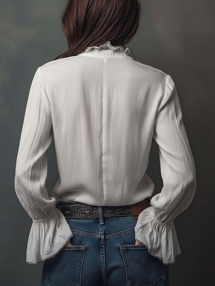 Bequeme Damenbluse mit flexiblem Reißverschluss-Ausschnitt & femininen Volantmanschetten. Elegantes Langarmshirt.