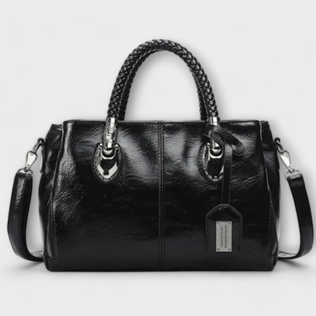 Zeitlose Damenhandtasche mit strukturiertem Griff, das perfekte Accessoire für elegante Sommer-Stylings.
