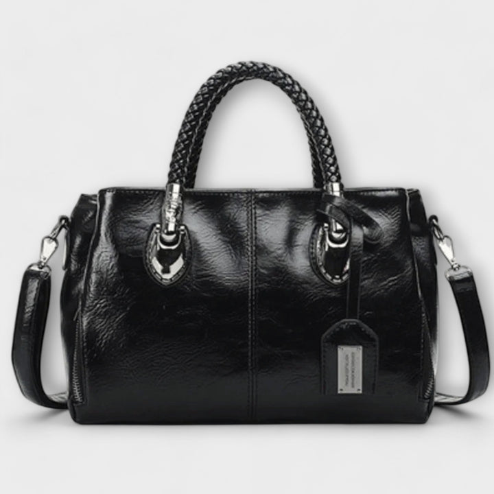 Zeitlose Damenhandtasche mit strukturiertem Griff, das perfekte Accessoire für elegante Sommer-Stylings.