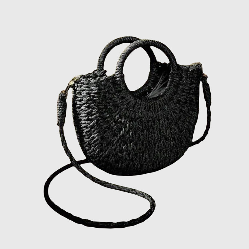 Leichte Sommertasche in Naturfarben, eine elegante Damenhandtasche im Boho-Stil.