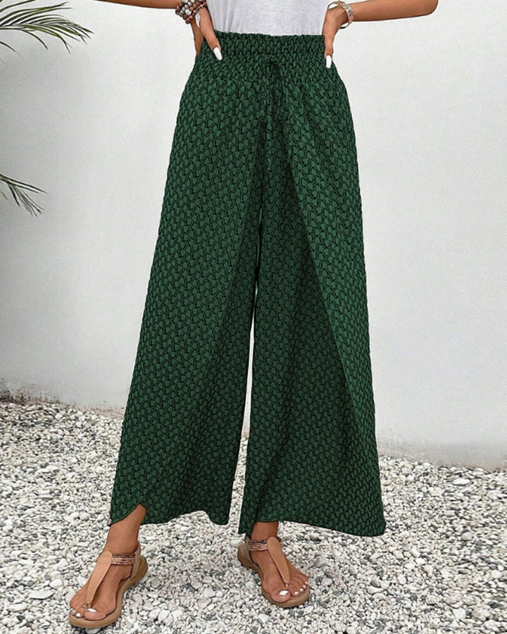 Damenhose mit figurfreundlichem hohem Bund & fließendem weitem Bein. Eleganz trifft Komfort für jede Figur.