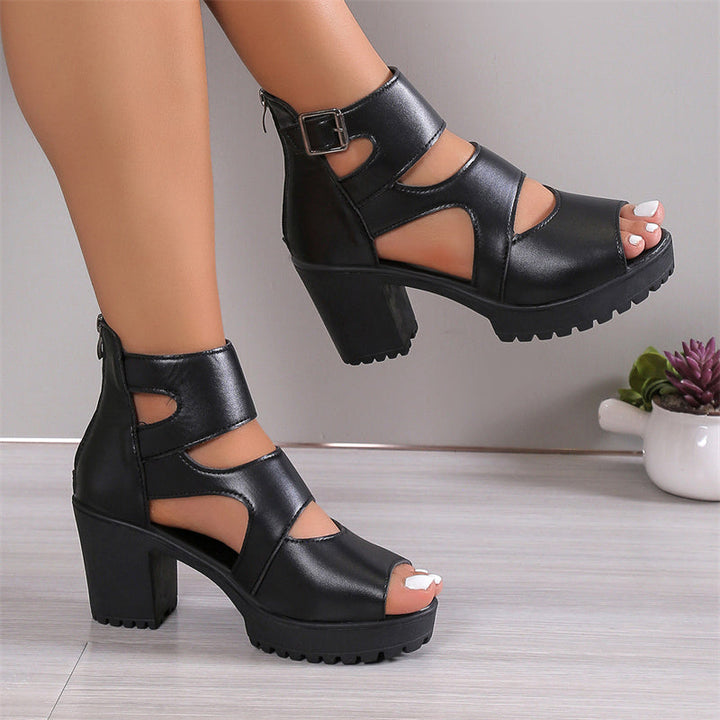Elegante Damensandalen mit Peep-Toe-Design, hohem Blockabsatz und verstellbarem Knöchelriemen in Schwarz.