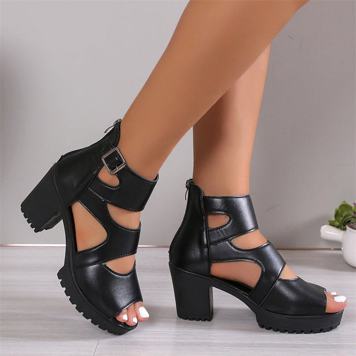 Elegante Damensandalen mit Peep-Toe-Design, hohem Blockabsatz und verstellbarem Knöchelriemen in Schwarz.