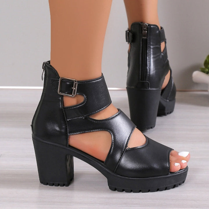 Elegante Damensandalen mit Peep-Toe-Design, hohem Blockabsatz und verstellbarem Knöchelriemen in Schwarz.