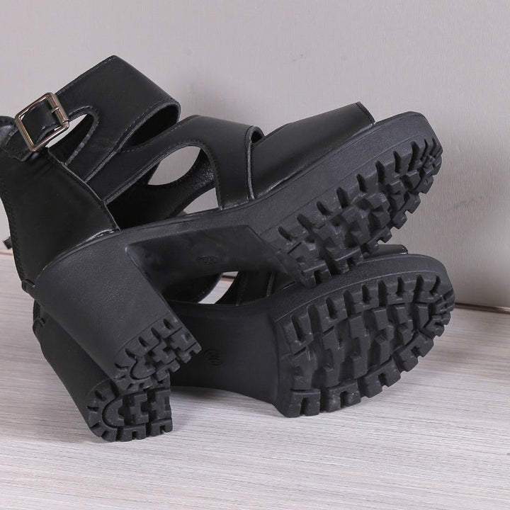 Elegante Damensandalen mit Peep-Toe-Design, hohem Blockabsatz und verstellbarem Knöchelriemen in Schwarz.
