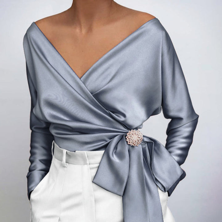 Elegante blaue glänzende Damenbluse, vielseitig kombinierbar. Perfekt als Business- oder festliche Abendbluse.
