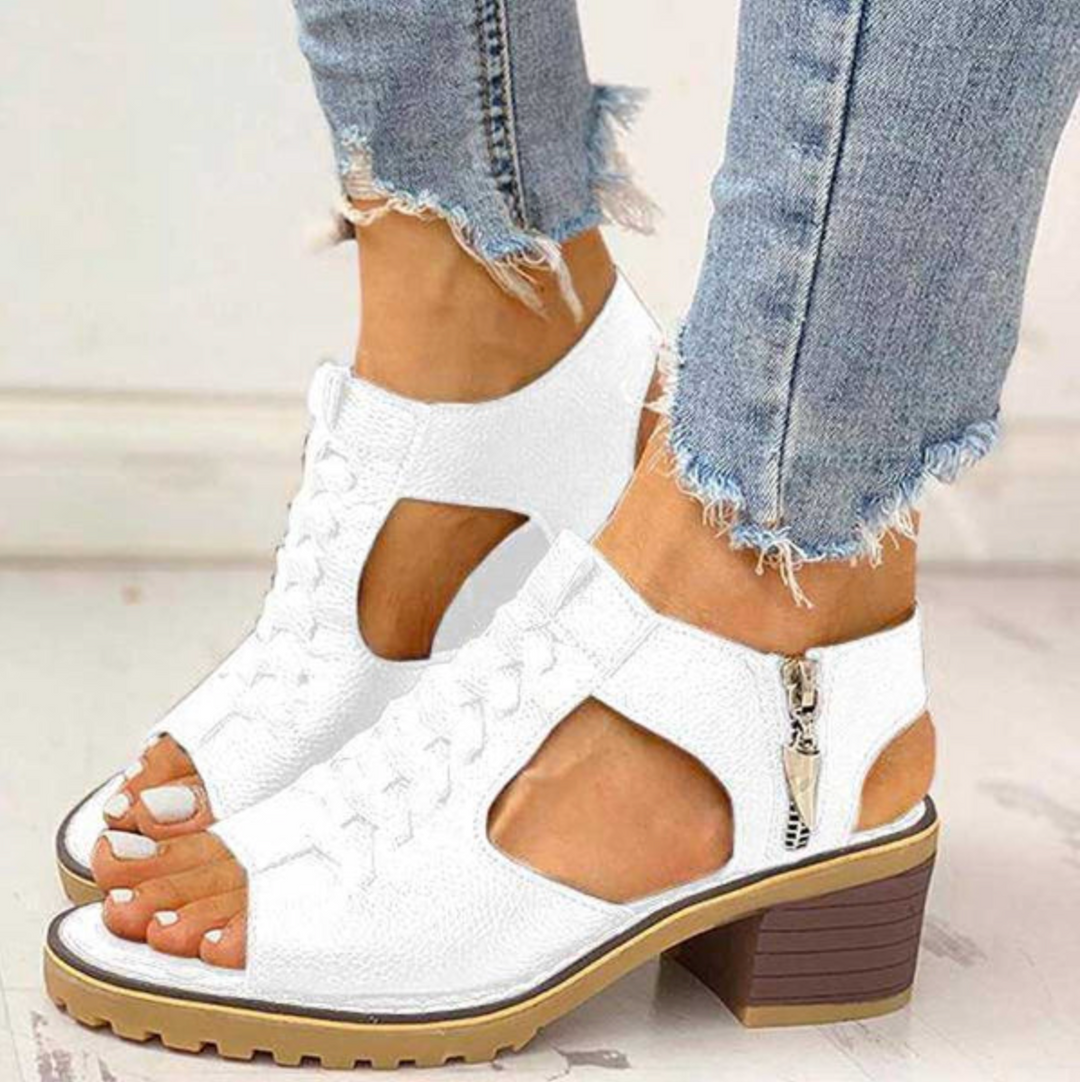 Bequeme hochhackige Sandalen für Damen. Die stützenden Riemchensandalen bieten Komfort für Hochzeit & Party im Sommer.