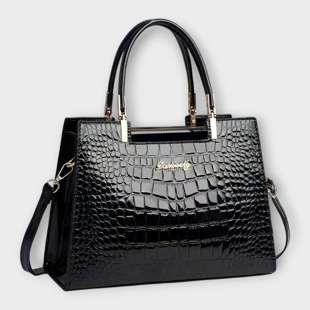 Elegante klassische Damen Handtasche in hochwertiger Lederoptik. Perfektes modisches Accessoire für Alltag und Büro.