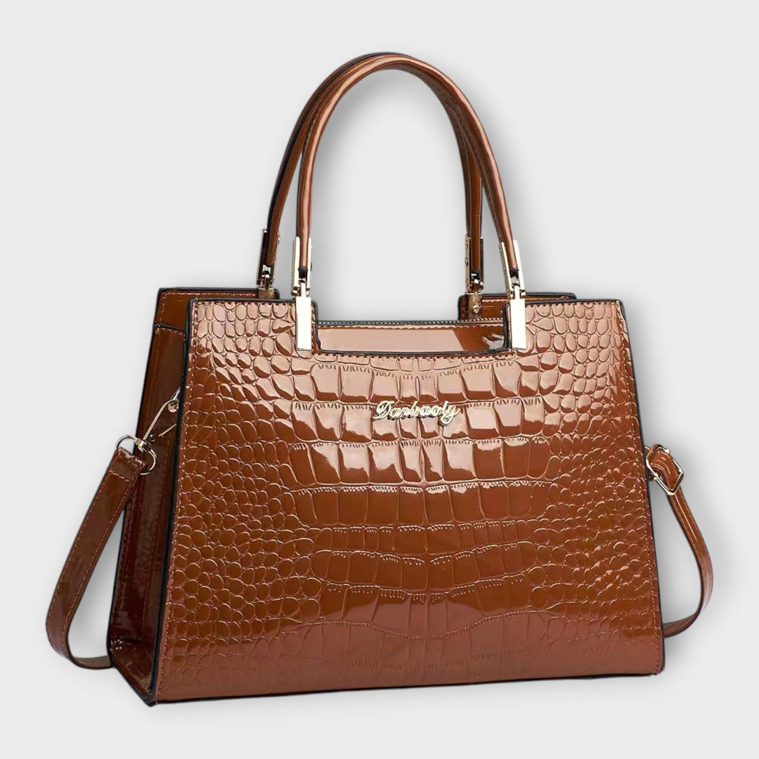 Farbenfrohe, elegante Damen Handtasche in klassischem Design. Ein stilvolles Sommer-Accessoire in Lederoptik.