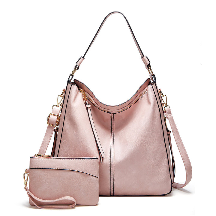 Seitenansicht der eleganten Damen Ledertasche. Schlankes Design und hochwertige Verarbeitung.