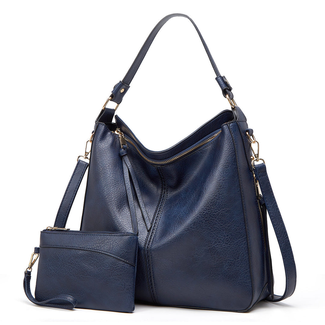 Rückseite der klassischen Damen Ledertasche. Schlichtes Design, ideal für stilbewusste Frauen.
