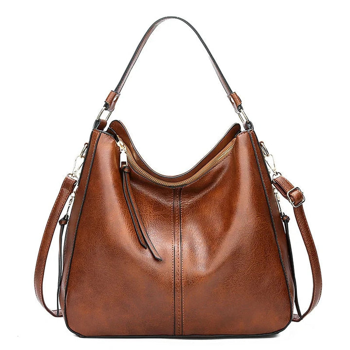 Nahaufnahme der Lederstruktur der eleganten Damenhandtasche. Zeigt Premium-Qualität.