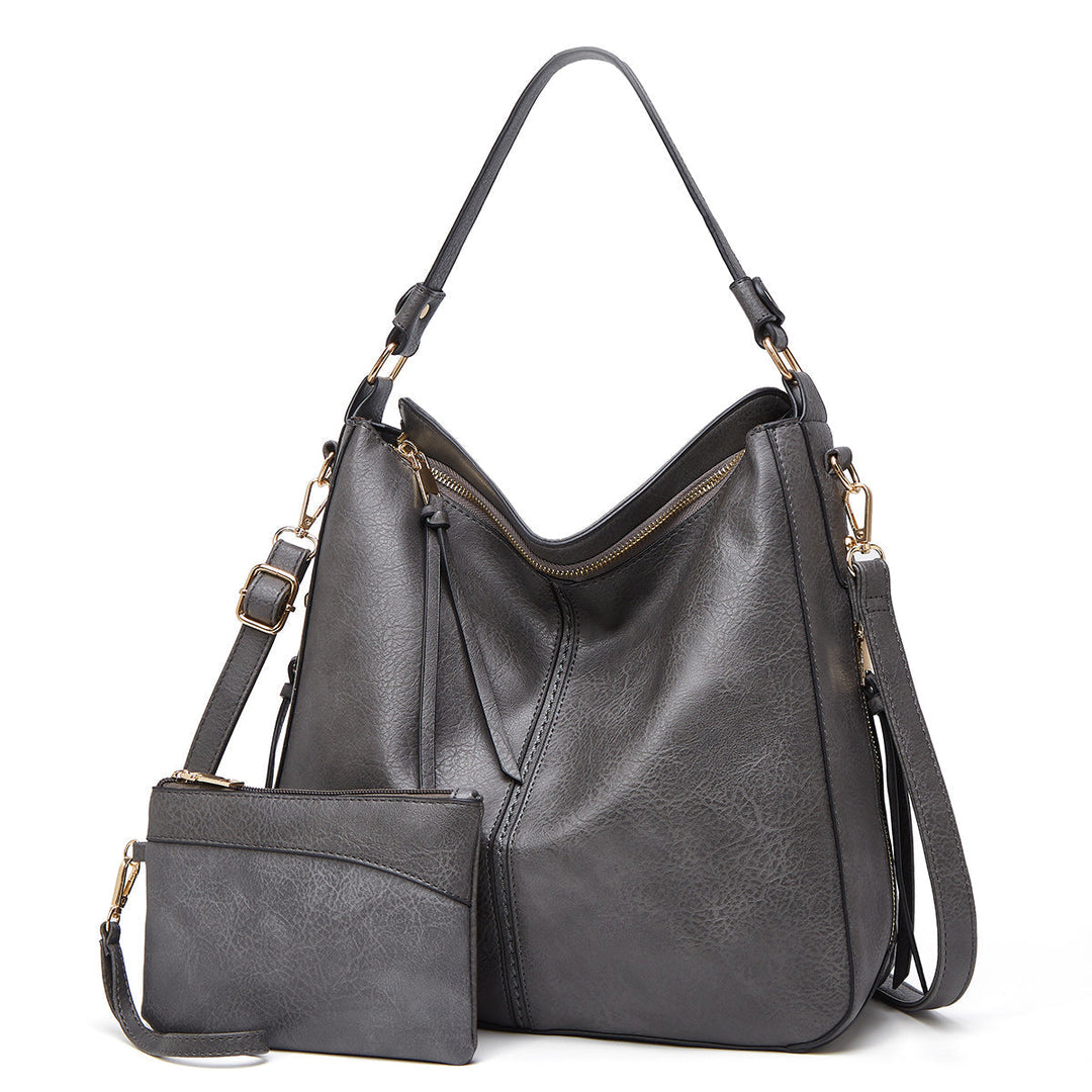 Vielseitige Ledertasche für Damen. Tragbar als Schultertasche, Umhängetasche oder elegante Handtasche.