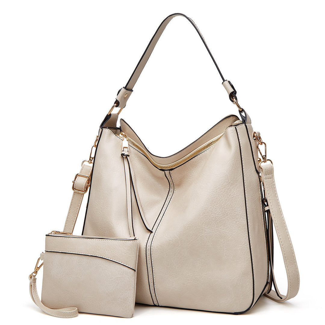 Vorderansicht der eleganten Damen Ledertasche. Klassische Form und glänzendes Leder.