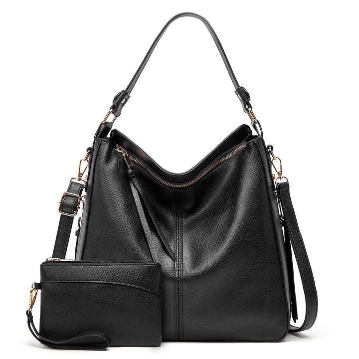 Detailaufnahme der edlen Ledertasche mit glänzendem Verschluss. Stilvolles Accessoire.
