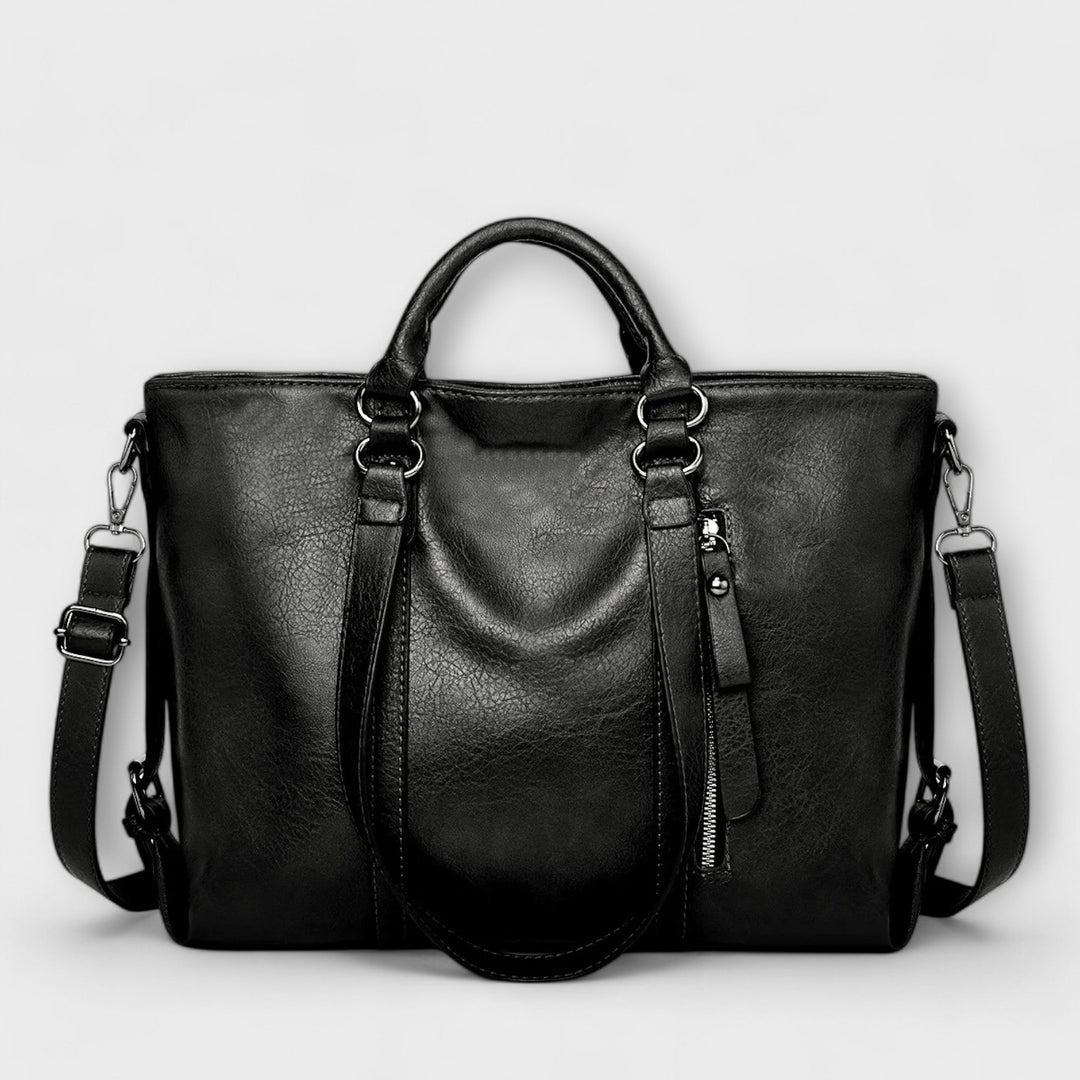 Hochwertige schwarze Damen-Arbeitstasche, elegante Textur und stabile Henkel, ideal für den stilvollen Berufsalltag.