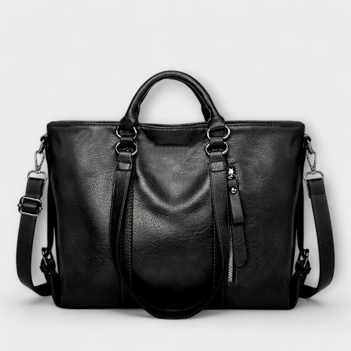Hochwertige schwarze Damen-Arbeitstasche, elegante Textur und stabile Henkel, ideal für den stilvollen Berufsalltag.