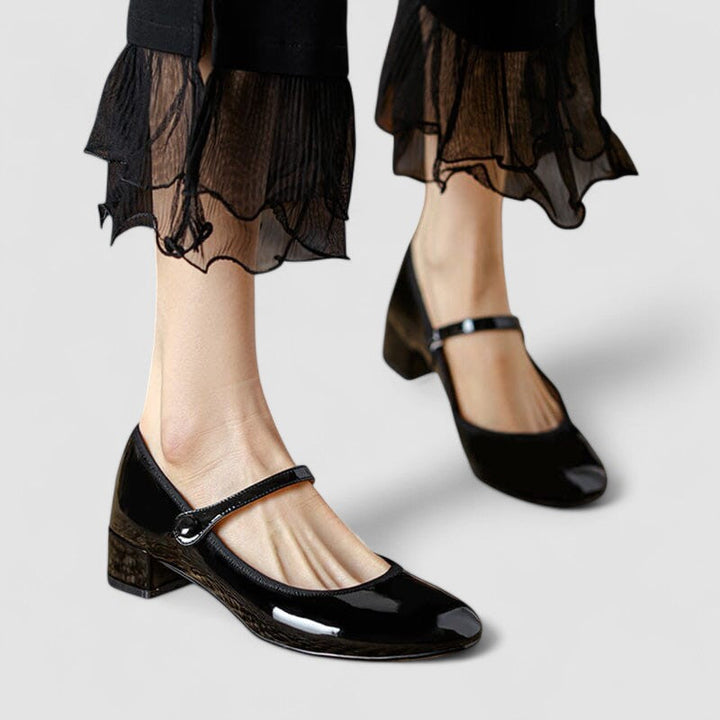 Elegante schwarze Damen Mary-Jane-Schuhe mit Schnallenriemen, flacher Sohle für Komfort und Alltag.
