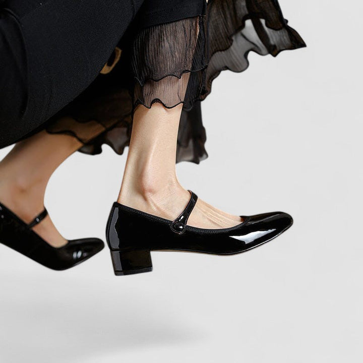 Bequeme schwarze Mary-Jane-Damen-Schuhe mit klassischem Schnallenriemen, ideal für Eleganz im Alltag.
