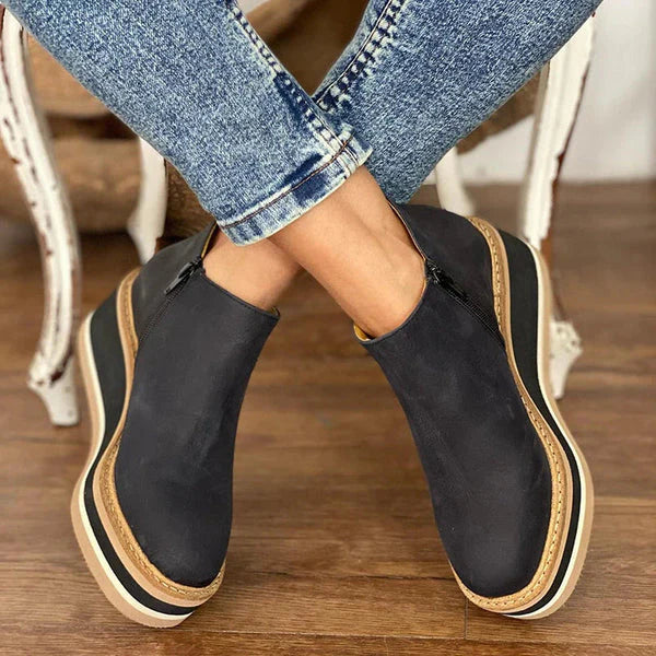 Vielseitige flache Stiefeletten für Damen in Khaki, ideal als bequeme Alltags- und Winterschuhe mit Reißverschluss.