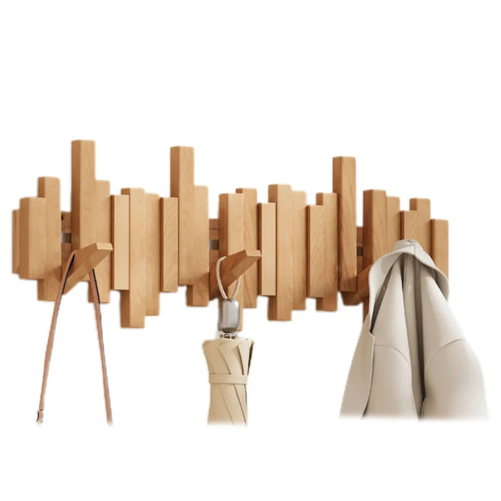 Glänzende Wandgarderobe aus Nussbaumholz, mit klarem Design und robusten Haken für eine moderne Ästhetik.
