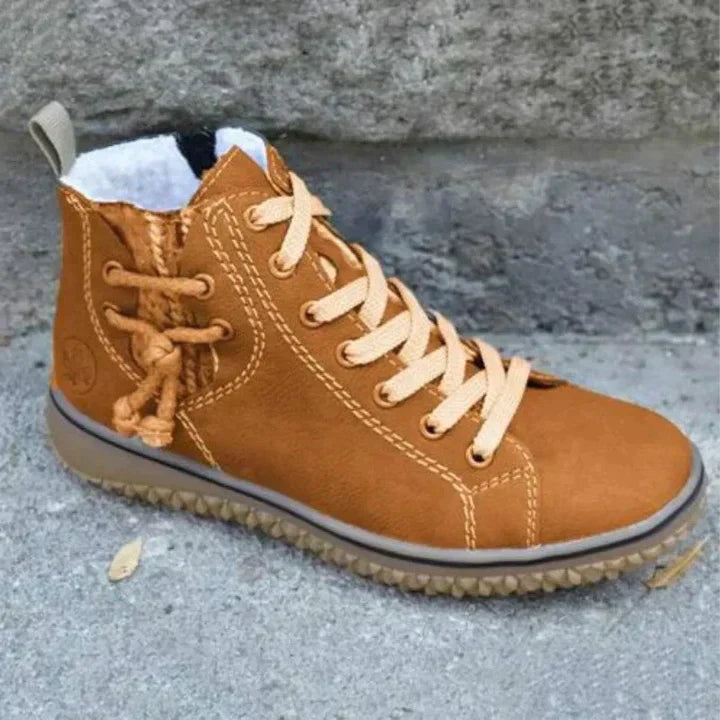 Elegante Damen Winterstiefel in Braun, Vintage-Look mit rutschfester Sohle und warmem Futter.